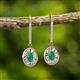 2 - Dahlia Iris Oval Cut Emerald and Baguette Diamond Halo Dangling Earrings 