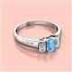 2 - Sharon 6x4 mm Emerald Cut Blue Topaz and Diamond Trellis Three Stone Engagement Ring 