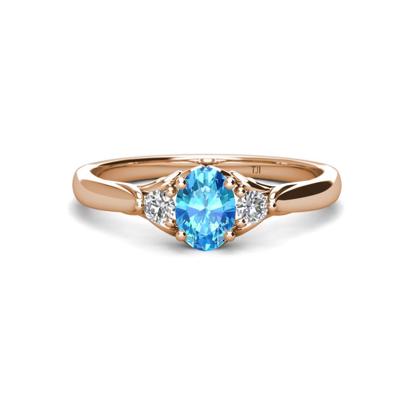 Gianna 7x5 mm Oval Shape Blue Topaz and Round Lab Grown Diamond Three Stone Engagement Ring 